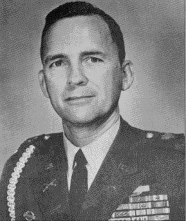 Portrait of Ralph Puckett Jr. (public domain, via Wikimedia Commons)